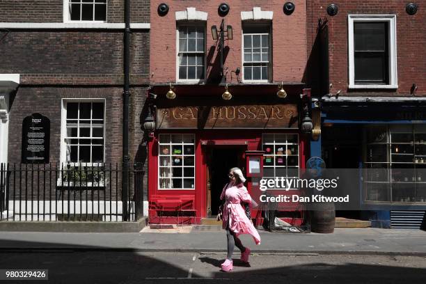 Woman walks past the Hungarian restaurant, 'Gay Hussar' in Soho on June 21, 2018 in London, England. The restaurant is due to close its doors tonight...