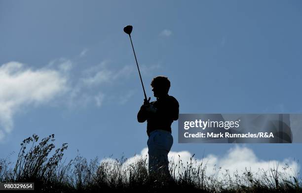 Tom Slowman of Taunton & Pickeridge plays his tee shot at the 4th hole during the fourth day of The Amateur Championship at Royal Aberdeen on June...