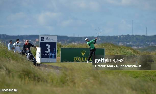 Rowan Lester of hermitage plays his tee shot at the 3rd hole during the fourth day of The Amateur Championship at Royal Aberdeen on June 21, 2018 in...