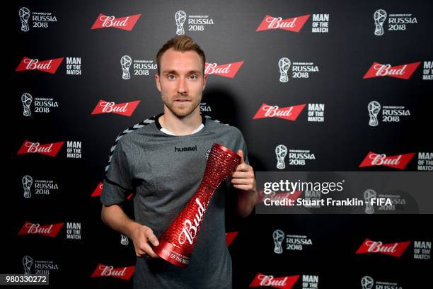 Christian Eriksen of Denmark poses with his Man of the Match trophy following the 2018 FIFA World Cup Russia group C match between Denmark and...