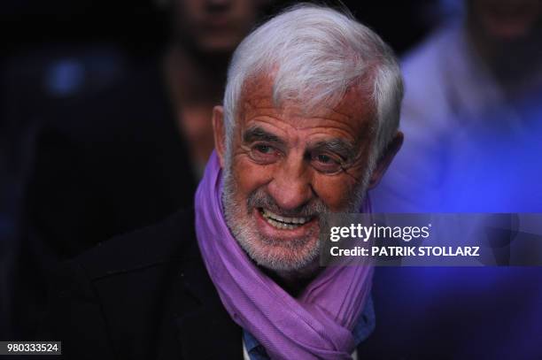 French actor Jean-Paul Belmondo attends the IBF, IBO, WBO and WBA title bout Ukrainian heavyweight boxing world champion Wladimir Klitschko between...