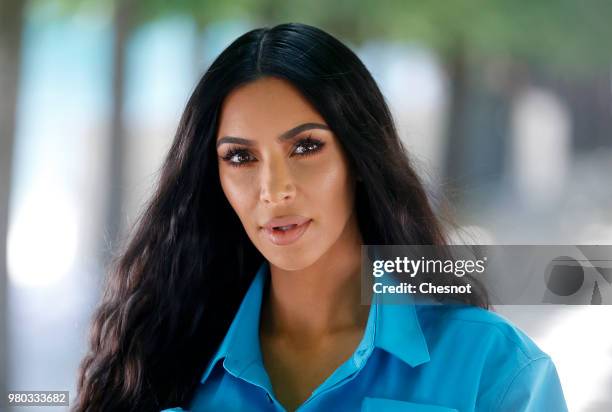 Kim Kardashian attends the Louis Vuitton Menswear Spring/Summer 2019 show as part of Paris Fashion Week Week on June 21, 2018 in Paris, France.