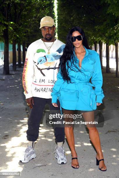 Kanye West and Kim Kardashian attend the Louis Vuitton Menswear Spring/Summer 2019 show as part of Paris Fashion Week on June 21, 2018 in Paris,...