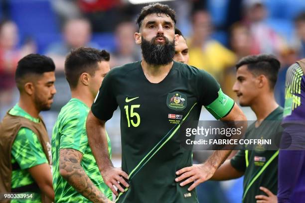 Australia's midfielder Mile Jedinak reacts after the final whistle during the Russia 2018 World Cup Group C football match between Denmark and...