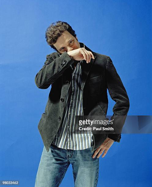 Actor Colin Firth poses for a portrait shoot for Esquire magazine in London on October 8, 2003.