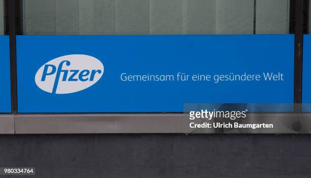 Exterior view of the buildings of the pharmaceutical company Pfizer Germany GmbH in Berlin - logo.