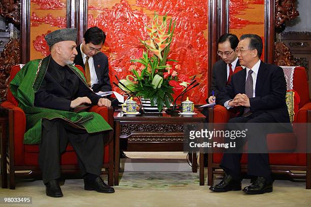 Chinese Premier Wen Jiabao meets with Afghan President Hamid Karzai on March 25, 2010 in Beijing, China. Karzai is on a three day state visit to...