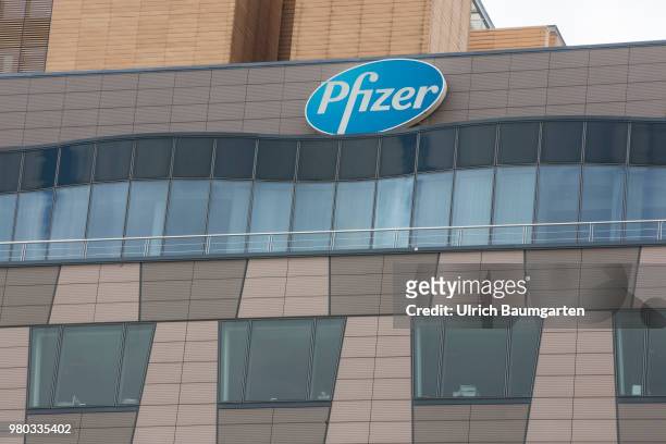Exterior view of the buildings of the pharmaceutical company Pfizer Germany GmbH in Berlin with Pfizer logo.
