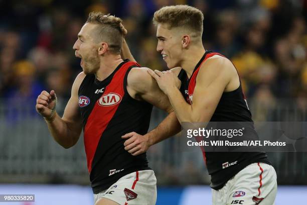 Devon Smith of the Bombers celebrates after scoring a goal during the round 14 AFL match between the West Coast Eagles and the Essendon Bombers at...
