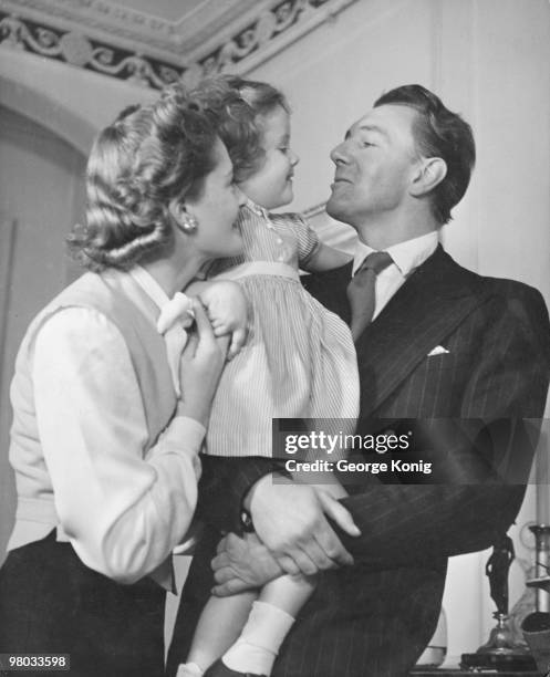 Married British actors, Michael Redgrave and Rachel Kempson with their three year-old daughter Lynn, 31st October 1946.