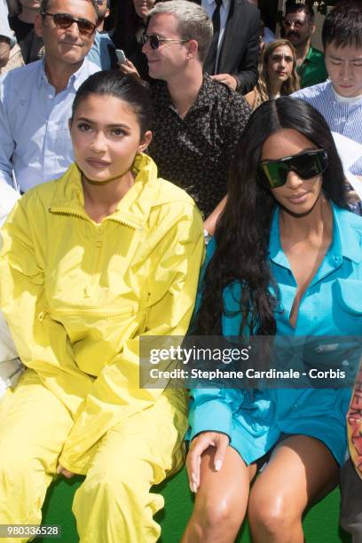 Kylie Jenner and Kim Kardashian attend the Louis Vuitton Menswear Spring/Summer 2019 show as part of Paris Fashion Week Week on June 21, 2018 in...