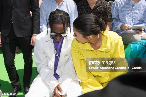 Travis Scott and Kylie Jenner attend the Louis Vuitton Menswear Spring/Summer 2019 show as part of Paris Fashion Week Week on June 21, 2018 in Paris,...