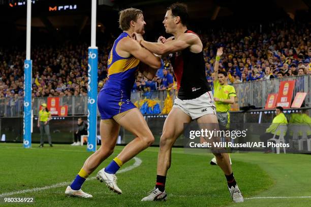 Jackson Nelson of the Eagles and Matt Dea of the Bombers tussle during the round 14 AFL match between the West Coast Eagles and the Essendon Bombers...