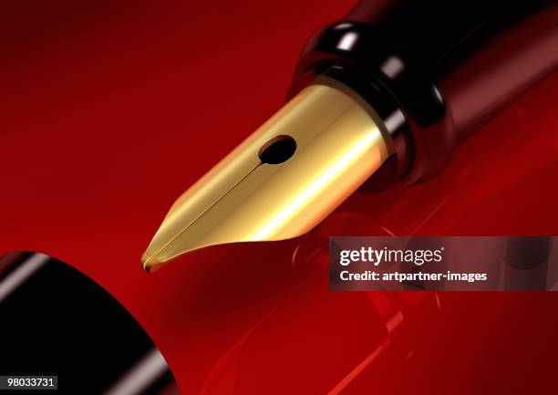 closeup of a golden luxury pen - expensive fountain pen stock pictures, royalty-free photos & images