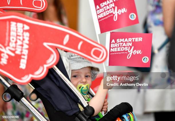 Young boy waves flags as Kirstie Allsopp, Phil Spencer and Susan Calman tour the UK this summer to inspire Britain's households to choose a smart...