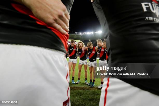 Dyson Heppell of the Bombers speaks to the huddle at the start of the game during the round 14 AFL match between the West Coast Eagles and the...