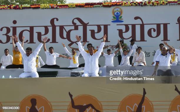 Madhya Pradesh Chief Minister Shivraj Singh Chouhan along with others performs yoga at Lal Parade Ground on the occasion of the 4th International Day...