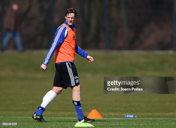 Marcell Jansen of Hamburg is seen injured during the Hamburger SV training session at the HSH Nordbank Arena on March 25, 2010 in Hamburg, Germany.