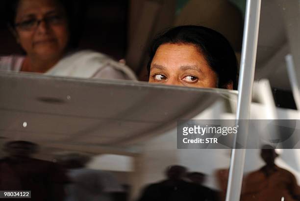 Anoma Fonseka, wife of former Sri Lankan army chief and detained presidential candidate Sarath Fonseka, leaves the court in Colombo on March 25,...