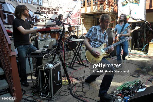 Axel Rose, Erin Tate, Dave Knudson and Jake Snider of Minus The Bear perform at Cedar Street Courtyard during day two of SXSW 2010 Music Festival on...