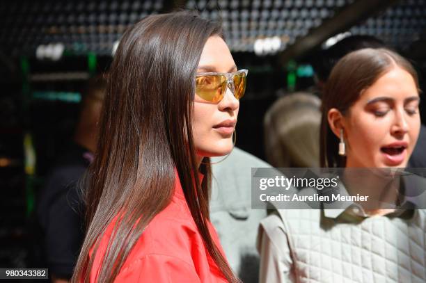 Bella Hadid wearing the Nike Tailwind HP performance sunglasses, is seen backstage during the Heron Preston Menswear Spring/Summer 2019 "En Vogue"...