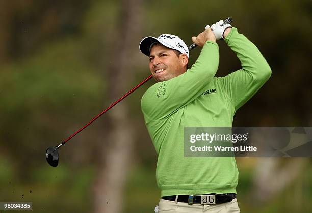 David Howell of England plays his second shot into the 18th green during the first round of the Open de Andalucia 2010 at Parador de Malaga Golf on...