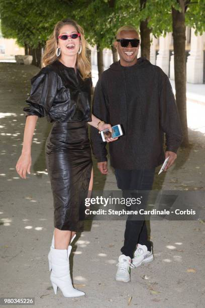 Model Doutzen Kroes and husband Sunnery James attend the Louis Vuitton Menswear Spring/Summer 2019 show as part of Paris Fashion Week Week on June...