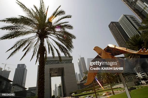 Statue of a falcon stands outside Dubai's International Financial Centre in the Gulf emirate on March 25, 2010. Dubai's main stock market index was...
