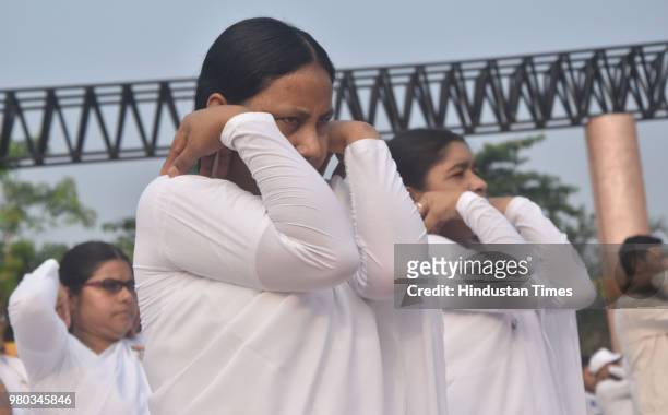 Members of Brahma Kumaris participate in a yoga session on the occasion of the 4th International Day of Yoga, at Sradhanjali Kanan on June 21, 2018...