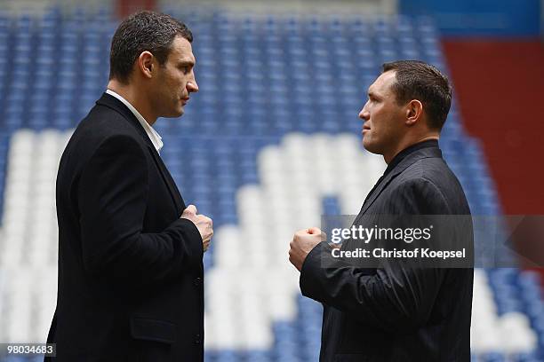 Vitali Klitschko of Ukraine poses with Albert Sosnowski of Poland before the press conference at Veltins Arena on March 25, 2010 in Gelsenkirchen,...