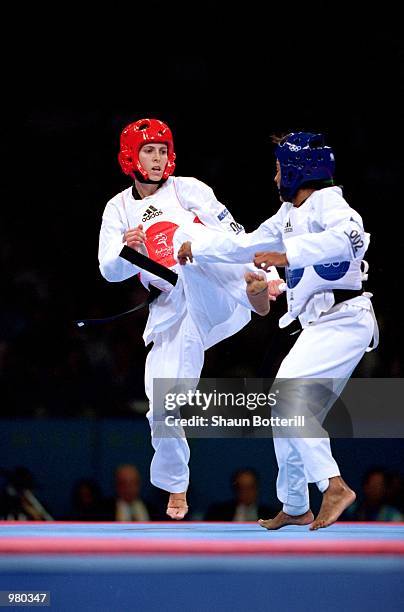 Lauren Burns of Australia and Urbia Melendez Rodriguez of Cuba in action during the Women's 49kg Taekwondo Final held at the State Sports Centre...