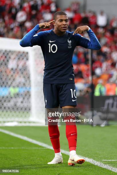Kylian Mbappe of France celebrates after scoring his team's first goal during the 2018 FIFA World Cup Russia group C match between France and Peru at...