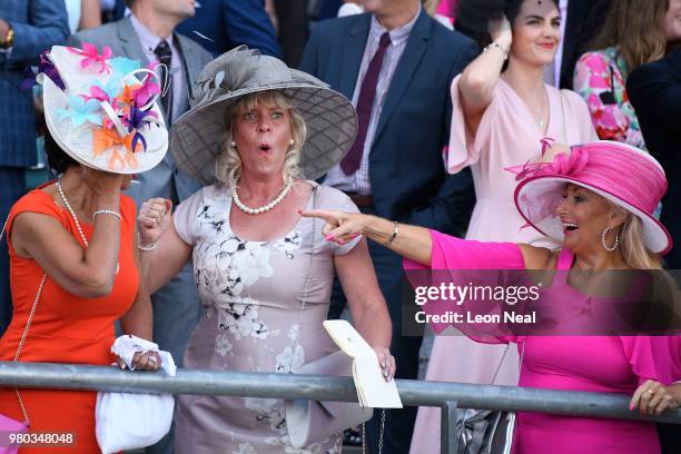 Racegoers react as the horses head to the finish line during Royal Ascot Day 3 at Ascot Racecourse on June 21, 2018 in Ascot, United Kingdom. Royal...