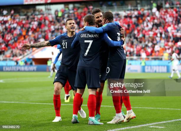 Kylian Mbappe of France celebrates with teammates Antoine Griezmann, Olivier Giroud and Lucas Hernandez after scoring his team's first goal during...