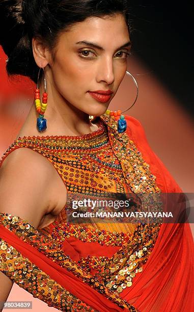 Model presents a creation by Indian designers Ashima-Leena during the Wills India Fashion Week Autumn-Winter 2010 in New Delhi on March 25, 2010....