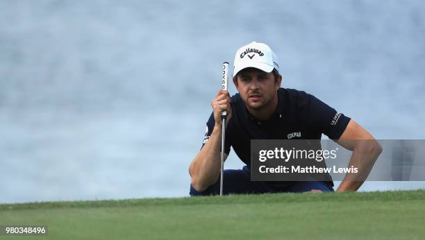 Sebastien Gros of France lines up a putt on the 17th green during day one of the BMW International Open at Golf Club Gut Larchenhof on June 21, 2018...