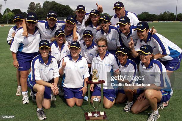 The NSWIS Blues team celebrate after recieving the trophy after defeating Queensland in game two to win the Women's National Cricket League Final...