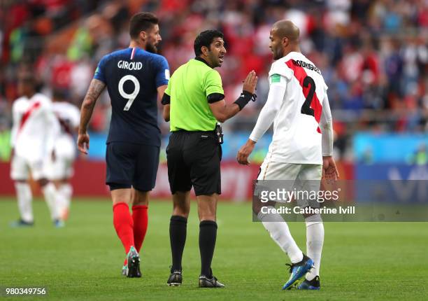 Alberto Rodriguez of Peru argues with Referee Mohammed Abdulla Mohamed during the 2018 FIFA World Cup Russia group C match between France and Peru at...