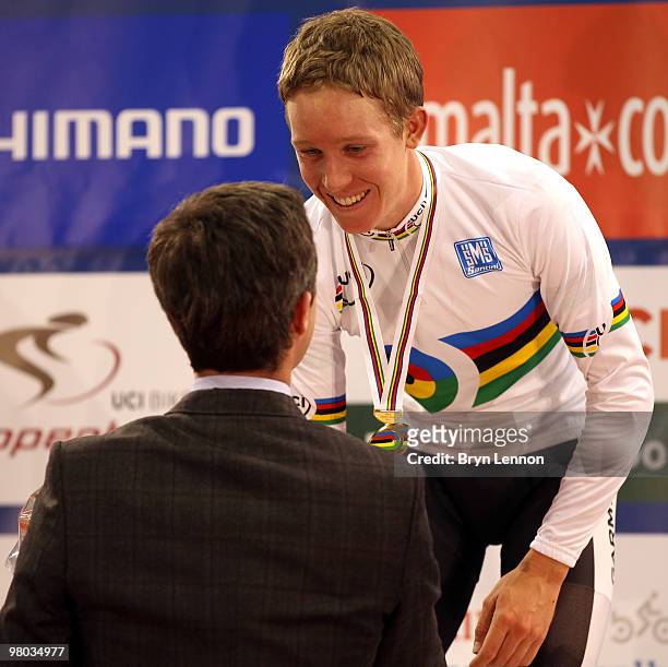 His Royal Highness Crown Prince Frederik of Denmark presents Cameron Meyer of Australia with his medal after winning the Men's Points Race on Day One...