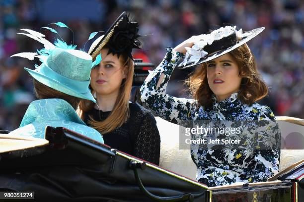 Princess Beatrice of York and Princess Eugenie of York arrive in the Royal Procession on day 3 of Royal Ascot at Ascot Racecourse on June 21, 2018 in...