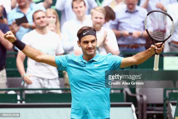 Roger Federer of Switzerland celebrates after defeating Benoit Paire of France during their round of 16 match on day 4 of the Gerry Weber Open at...