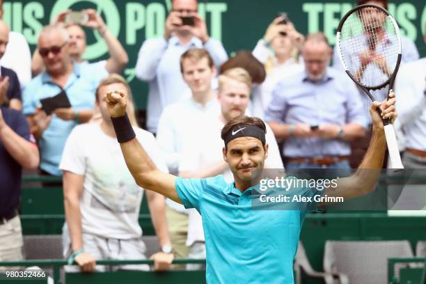 Roger Federer of Switzerland celebrates after defeating Benoit Paire of France during their round of 16 match on day 4 of the Gerry Weber Open at...