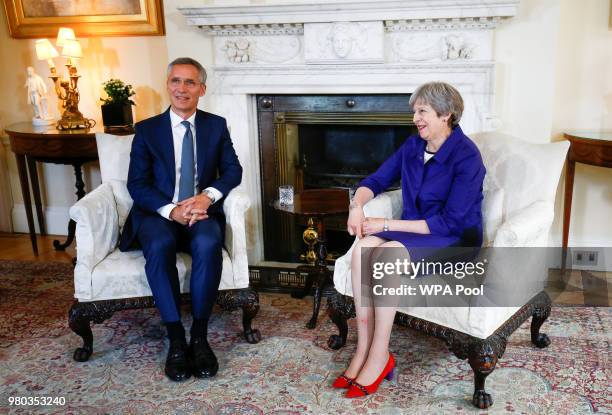 Britain's Prime Minister Theresa May hosts Secretary General of NATO Jens Stoltenberg inside Number 10 Downing Street on June 21, 2018 in London,...