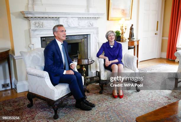 Britain's Prime Minister Theresa May hosts Secretary General of NATO Jens Stoltenberg inside Number 10 Downing Street on June 21, 2018 in London,...