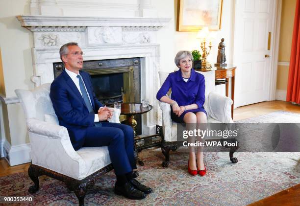 Britain's Prime Minister Theresa May hosts Secretary General of NATO Jens Stoltenberg inside Number 10 Downing Street on June 21, 2018 in London,...