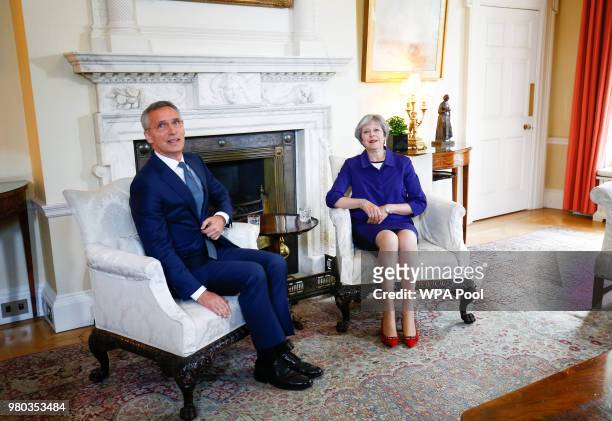 Britain's Prime Minister Theresa May hosts Secretary General of NATO Jens Stoltenberg inside Number 10 Downing Street on June 21, 2018 in London,...