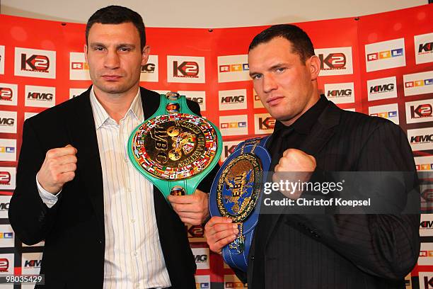 Vitali Klitschko of Ukraine poses with Albert Sosnowski of Poland after the press conference at Veltins Arena on March 25, 2010 in Gelsenkirchen,...