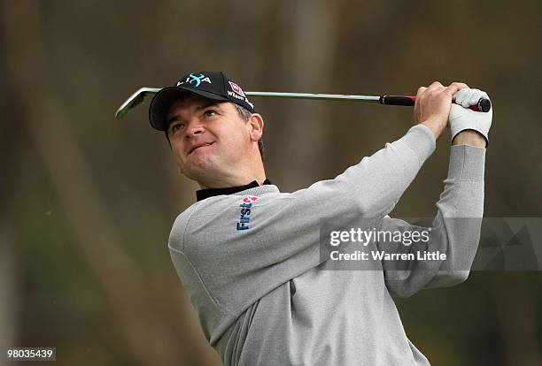 Paul Lawrie of Scotland plays his second shot into the seventh green during the first round of the Open de Andalucia 2010 at Parador de Malaga Golf...