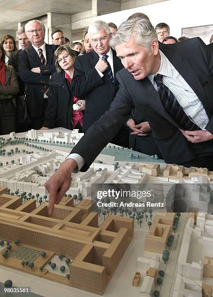 Architect Jan Kleihues points on a mockup of the BND building as Ernst Uhrlau , head of the German intelligence service, the BND, looks on during the...