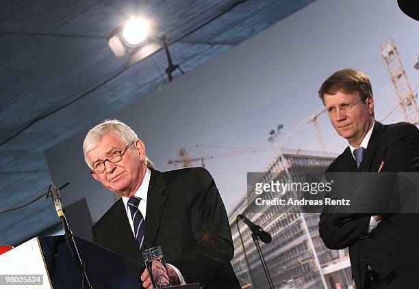Ernst Uhrlau , head of the German intelligence service, the BND, and Minister of the Chancellery Ronald Pofalla attend the topping-out ceremony of...